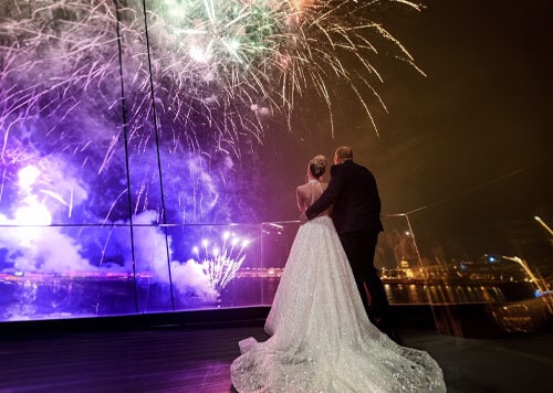 Weiding Couple looking at the firefox